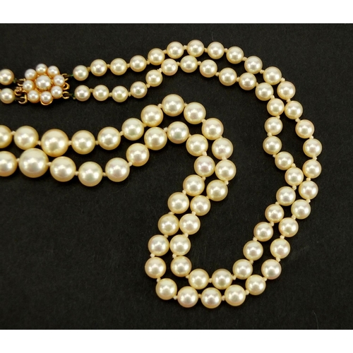 2733 - Two string pearl necklace, with 9ct gold clasp, 48cm in length, approximate weight 45.8g