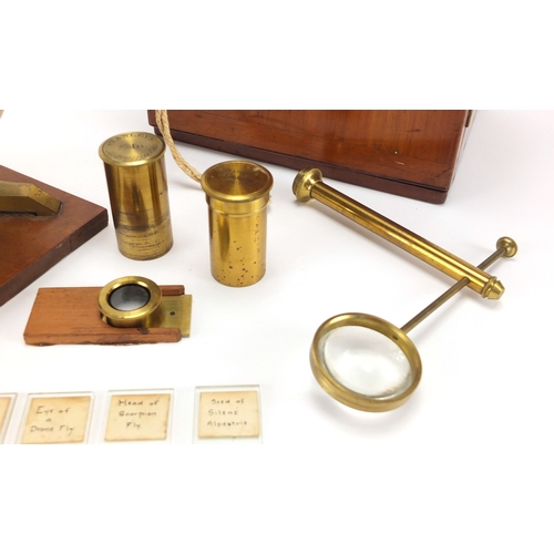 114 - 19th century adjsutable brass microscope with lenses and mahogany carrying case, by Stanley, Railway... 