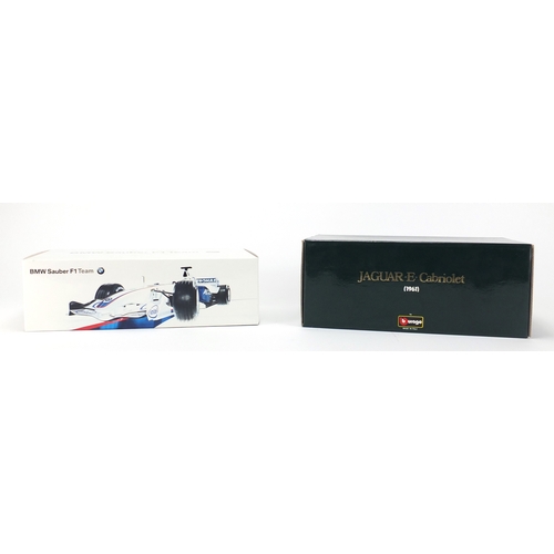 676 - Two die cast vehicles with boxes, scale 1:18 including a Nick Heidfield BMW Sauber