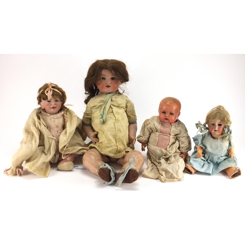 658 - Three bisque headed dolls and a German composite example including Armand Marseille 990 11 and Simon... 