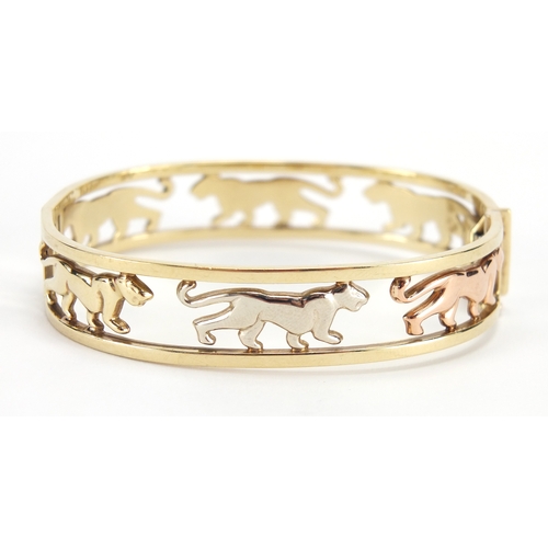 2586 - 9ct gold three tone jaguar bangle, 6.5cm x 5.5cm, approximate weight 19.2g