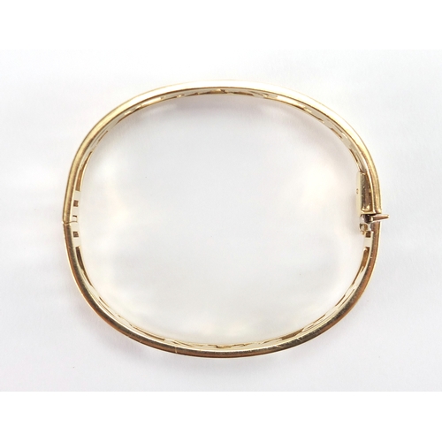 2586 - 9ct gold three tone jaguar bangle, 6.5cm x 5.5cm, approximate weight 19.2g