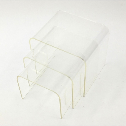 2075 - Retro nest of three bent Perspex occasional tables, the largest 37cm H x 41cm W x 33cm D