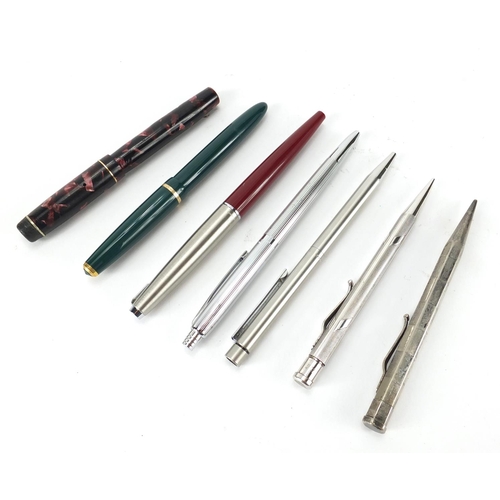 2501 - Fountain pens and propelling pencil including red marbleised Unique, Parker and Yard-O-Led