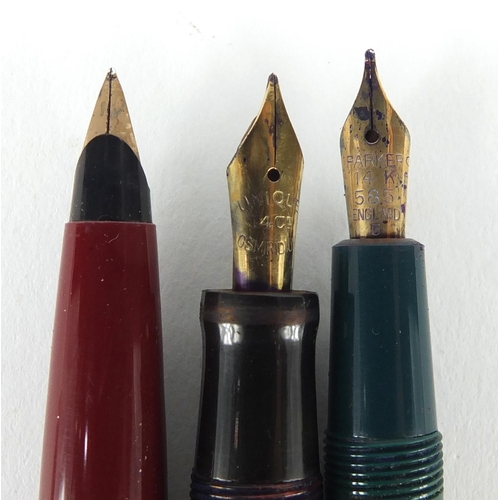 2501 - Fountain pens and propelling pencil including red marbleised Unique, Parker and Yard-O-Led