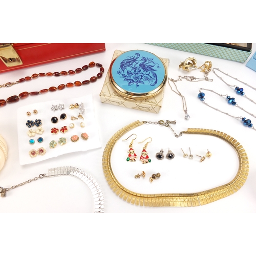 2816 - Costume jewellery including 9ct gold earrings, a pair of 14ct gold earrings, necklaces, brooches, br... 