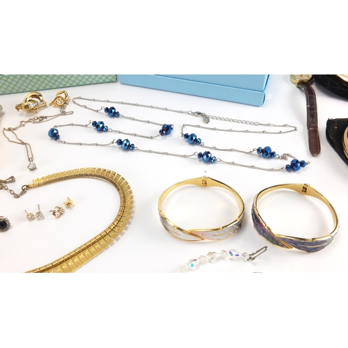 2816 - Costume jewellery including 9ct gold earrings, a pair of 14ct gold earrings, necklaces, brooches, br... 