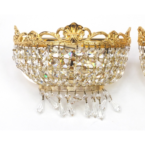 2084 - Pair of gilt brass and crystal wall lights with drops (purchased approximately ten years ago as Swar... 