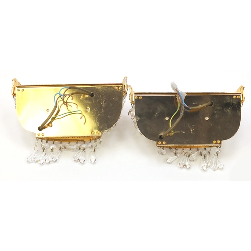 2084 - Pair of gilt brass and crystal wall lights with drops (purchased approximately ten years ago as Swar... 