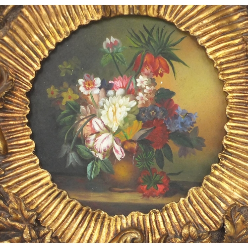 2081 - Pair of gilt wall brackets each having a circular panel hand painted with flowers, each 50cm