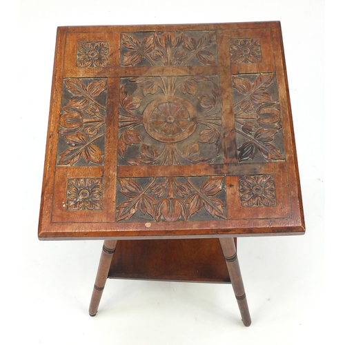 2073 - Square walnut occasional table, carved with flowers with tapering base and under tier, 55cm H x 39.5... 