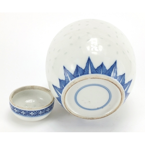 2337 - Chinese blue and white porcelain ginger jar and cover on hardwood stand, blue ring marks to the base... 