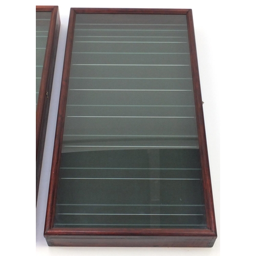 51 - Two mahogany glazed display cases, with glass shelves, each 95cm H x 49cm W x 10cm D