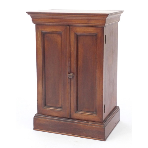 18 - Mahogany two door table top cupboard, 49cm H x 34cm W x 23cm D