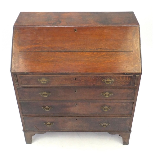 9 - Antique oak bureau, fitted with a fall and fitted interior above four graduated drawers, 109cm H x 9... 