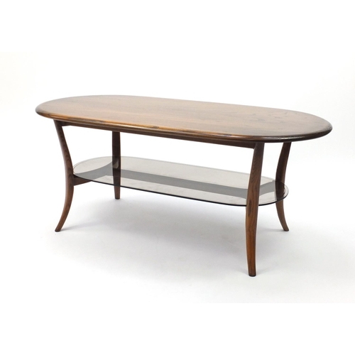 20A - Ercol elm oval coffee table with glass under tier, 48cm H x 113cm W x 58cm D