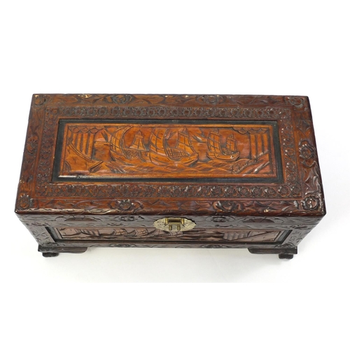 25 - Camphorwood blanket box, carved with ships at sea, 36cm H x 70cm W x 32cm D