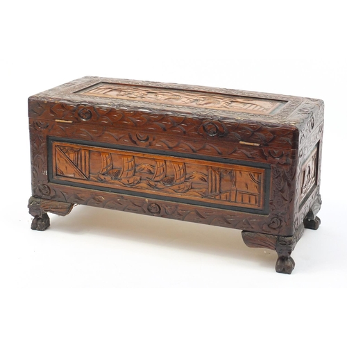 25 - Camphorwood blanket box, carved with ships at sea, 36cm H x 70cm W x 32cm D