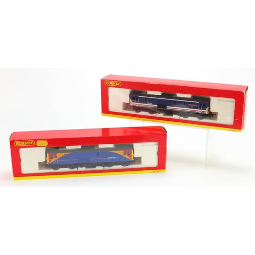 514 - Two Hornby OO gauge diesel locomotives with boxes, NSE 73129 City of Winchester and SW Trains 73235