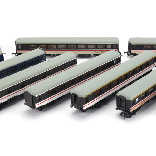 530 - Twelve Lima OO gauge carriages including 76301, Gatwick Express 72500 and 61281
