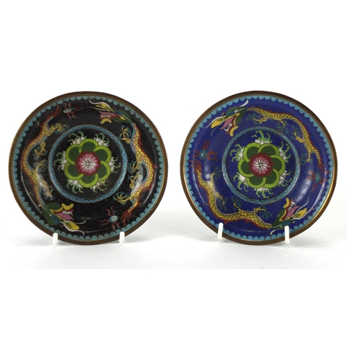 2119 - Two Chinese cloisonné bowls, enamelled with dragons chasing the flaming pearl, each 13cm in diameter