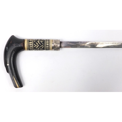 26 - Indian ebonised and carved bone sword stick with steel blade, 91cm in length