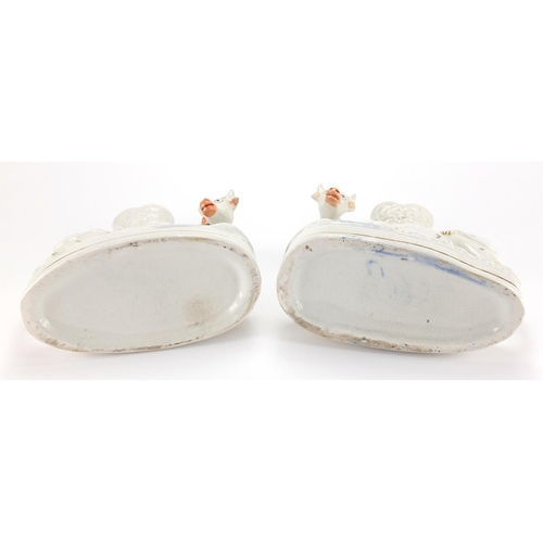 828 - Pair of Victorian Staffordshire flat back cow and calf spill vases, each 27.5cm high