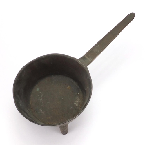 101 - Antique bronze three footed skillet, 37.5cm in length