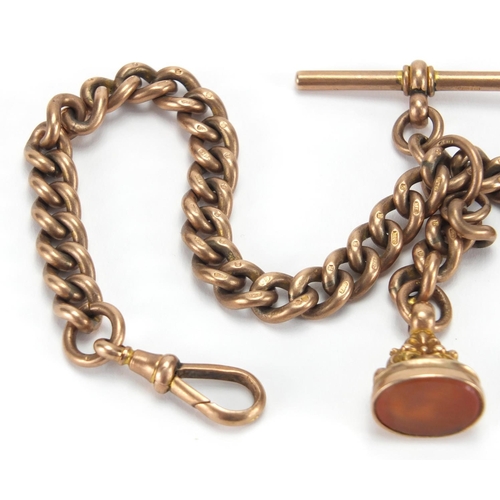 1049 - 9ct rose gold watch chain, with T bar and hardstone fob, 38cm in length, approximate weight 99.0g