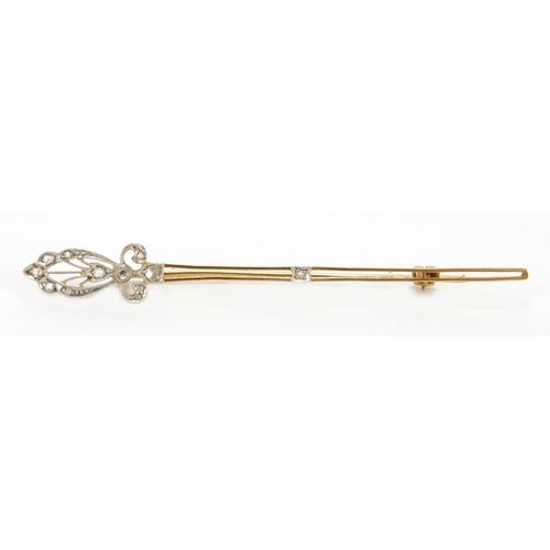 1072 - 18ct gold diamond bar brooch, 7.3cm in length, approximate weight 4.2g