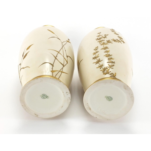 811 - Pair of Royal Worcester aesthetic porcelain vases, gilded with butterflies above flowers and ferns, ... 
