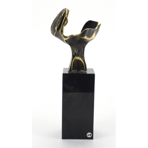 1017 - José Lucas 2000 - Modernist bronze sculpture raised on a square block base, 25.9cm high