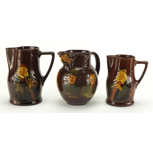 969 - Three Royal Doulton Kingsware jugs comprising an example decorated with Dickens characters, Would Yo... 