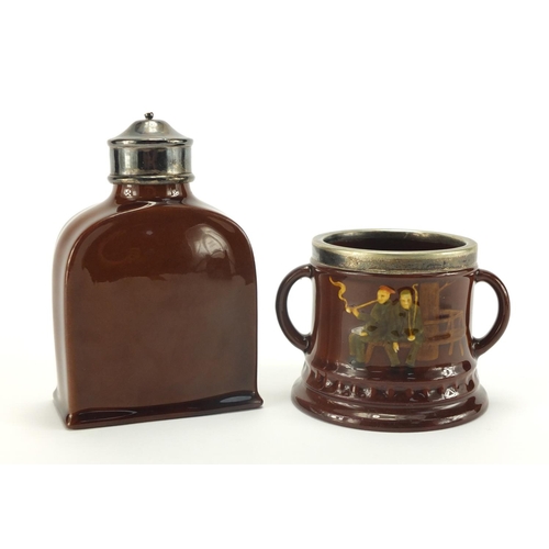 966 - Royal Doulton Kingsware tea caddy with silver lid and a twin handled cup, factory marks to the bases... 