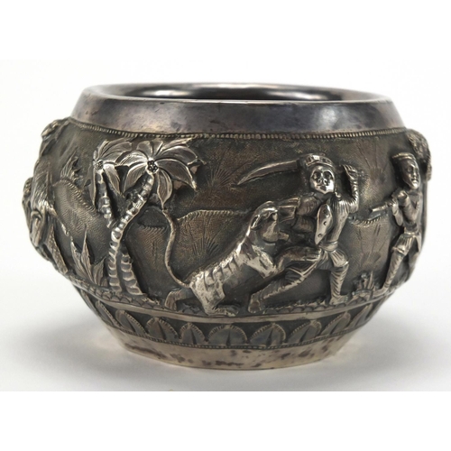 748 - Burmese unmarked silver bowl, embossed with huntsmen and animals, 7.5cm high, approximate weight 152... 