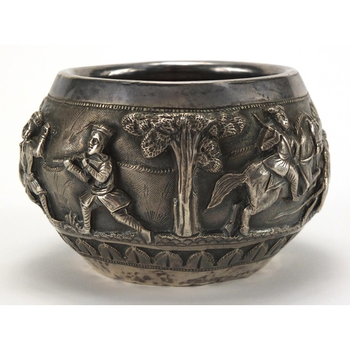 748 - Burmese unmarked silver bowl, embossed with huntsmen and animals, 7.5cm high, approximate weight 152... 