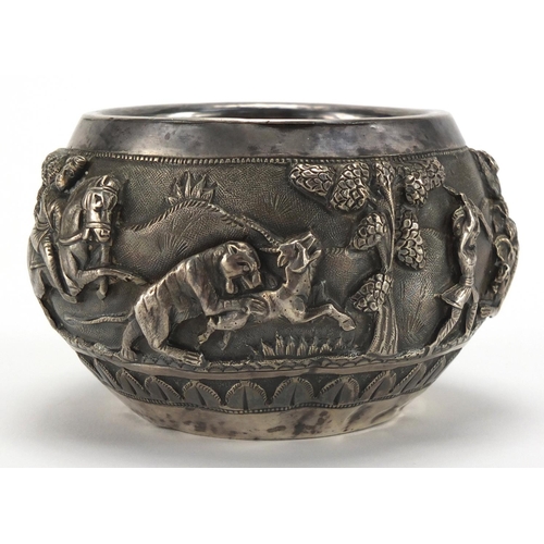 748 - Burmese unmarked silver bowl, embossed with huntsmen and animals, 7.5cm high, approximate weight 152... 