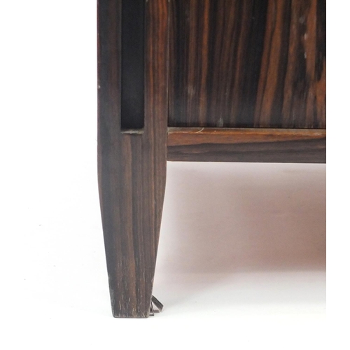 2015 - Madagascar ebony room divider, fitted with three galleried shelves above a pair of cupboard doors, e... 
