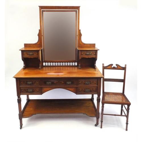 2010 - Edwardian inlaid mahogany dressing table fitted with an arrangement of drawers and mirrored back, to... 