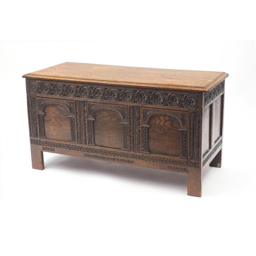 2009 - Oak coffer carved with roundels and arches, 59cm H x 110cm W x 46cm D