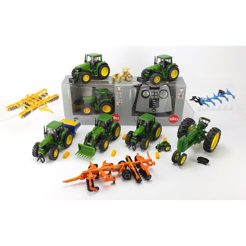 2099 - Precision model tractors, some die cast including Siku, Tim and a John Deere desk clock by the Danbu... 