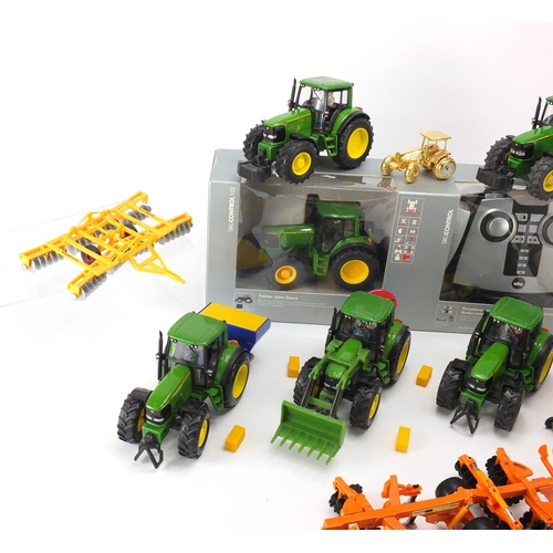 2099 - Precision model tractors, some die cast including Siku, Tim and a John Deere desk clock by the Danbu... 