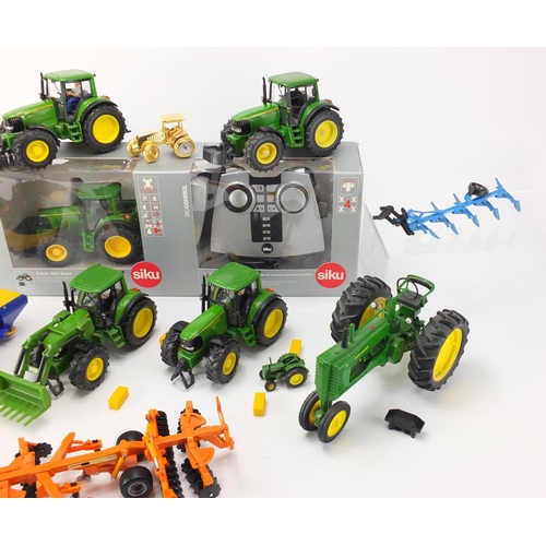 2099 - Precision model tractors, some die cast including Siku, Tim and a John Deere desk clock by the Danbu... 