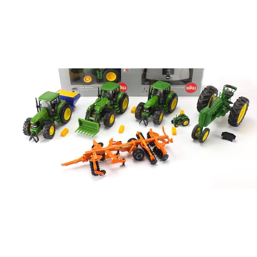 2099 - Precision model tractors, some die cast including Siku, Tim and a John Deere desk clock by the Danbu... 