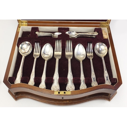 2035 - Viners six place canteen of Sheffield silver plated cutlery, housed in a serpentine fronted walnut c... 