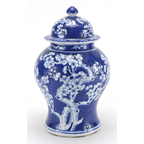 2072 - Chinese blue and white porcelain baluster jar and cover, hand painted with Prunus flowers, 27cm high