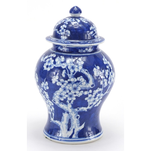 2072 - Chinese blue and white porcelain baluster jar and cover, hand painted with Prunus flowers, 27cm high