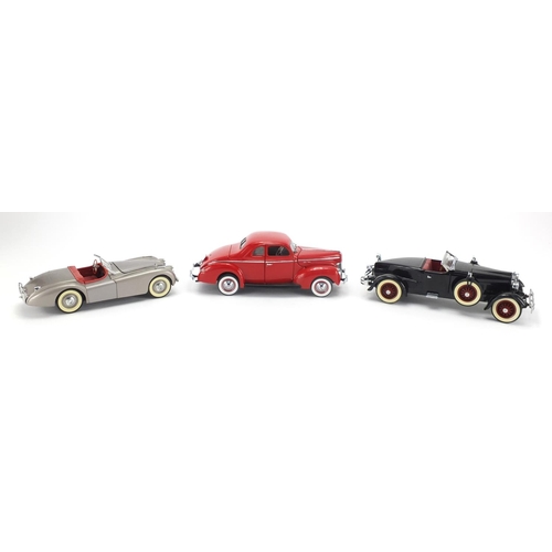 2065 - Three die cast precision model vehicles by The Danbury Mint, 1940 Ford Deluxe, Stutz Black Hawk and ... 