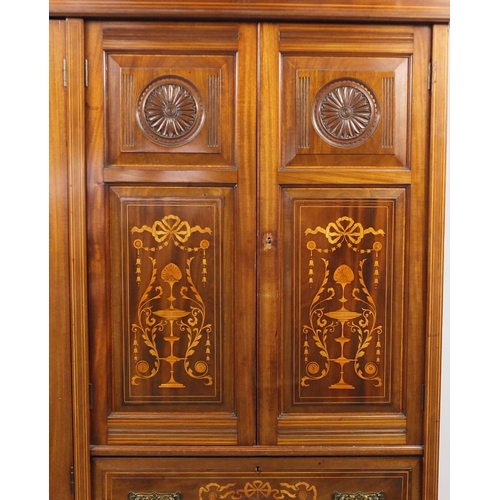 38 - Edwardian inlaid mahogany wardrobe with mirrored door, cupboard doors and four drawers, 197cm H x 13... 