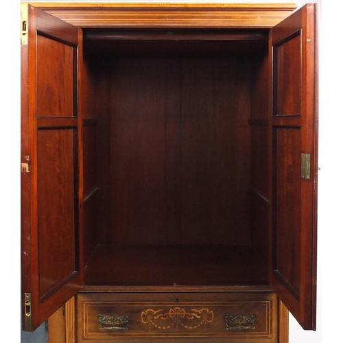 38 - Edwardian inlaid mahogany wardrobe with mirrored door, cupboard doors and four drawers, 197cm H x 13... 